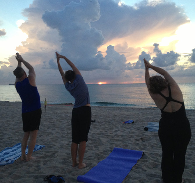 Women - Yoga on the beach