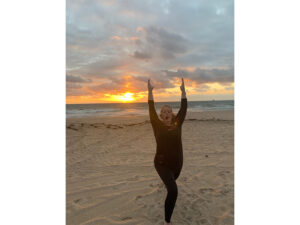 View of yoga instructor demonstrating pose