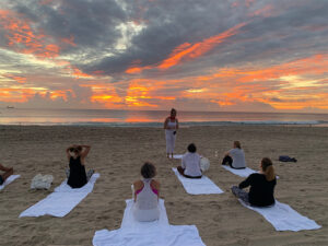 Stress Less Yoga - StressLess Yoga Retreat -Mind Mind Body Spirit Retreat - Ladies doing yoga on the beach