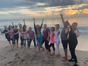 Yoga class posing together