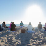 View of students facing the ocean