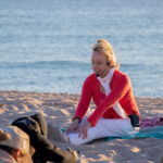 View of woman stretching and doing yoga